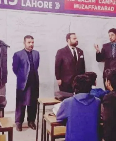 Info Consultants team meeting students at a Muzaffarabad campus