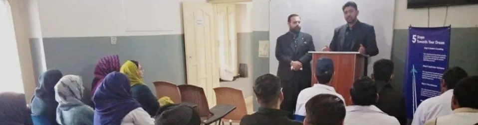 Abdullah Zaffar and the Info Consultants team presenting to students in Muzaffarabad